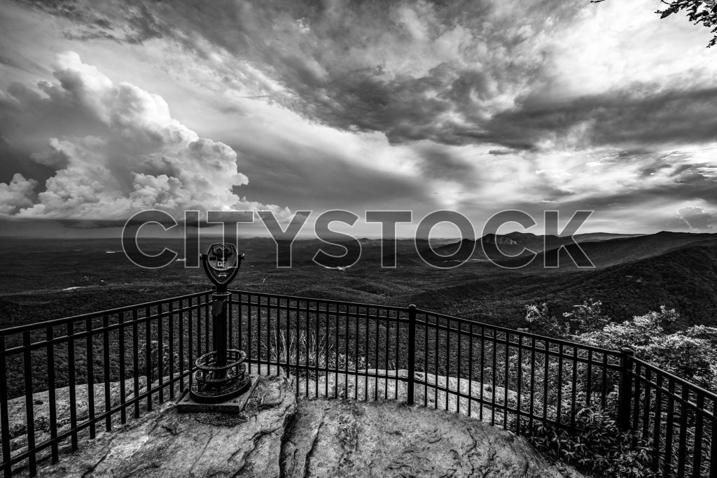 Black and white image of viewer binoculars overlooking mountains in Greenville