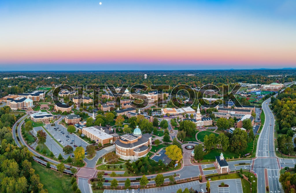 Aerial view of High Point, NC during sunset showing city layout