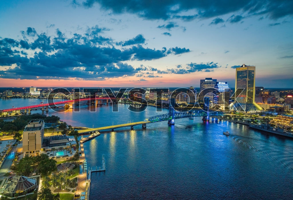 Aerial panorama of Jacksonville skyline and river at sunset