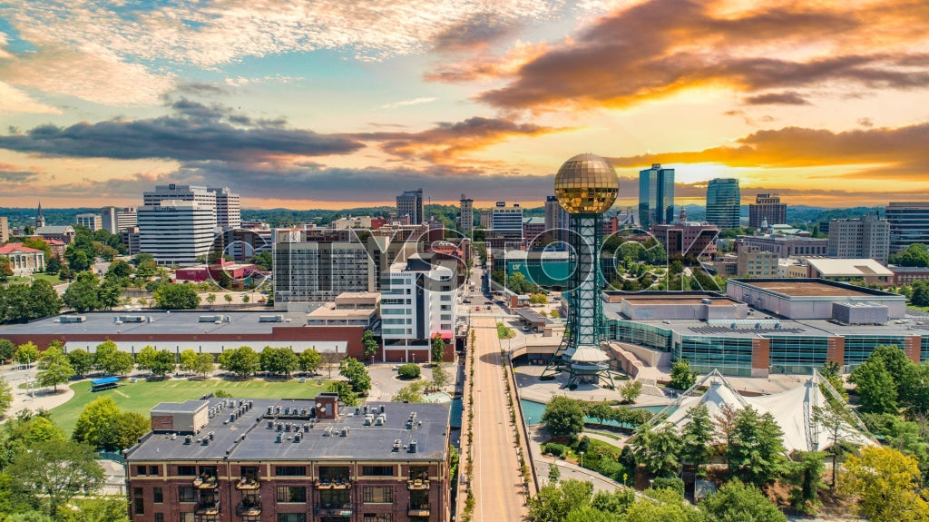 Golden sunset over the Knoxville skyline highlighting the Sunsphere