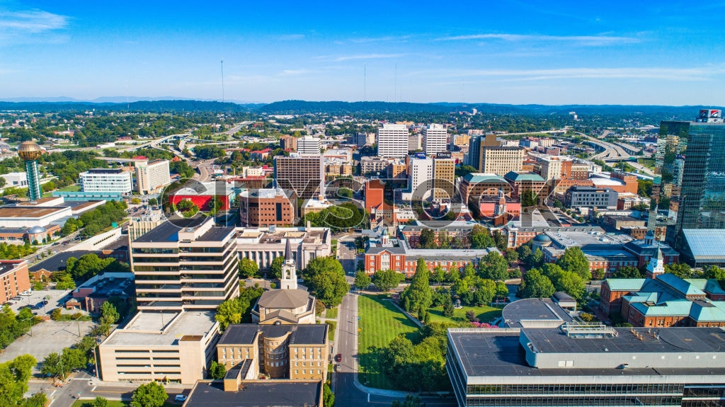 Aerial skyline view of Knoxville, Tennessee, with blue skies