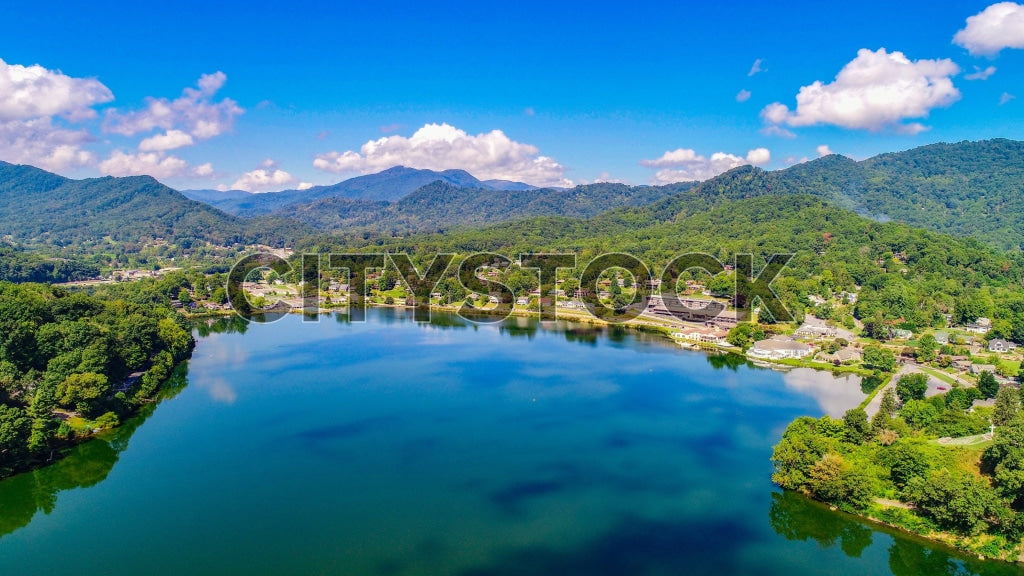 Aerial view of Lake Junaluska with mountains and blue sky