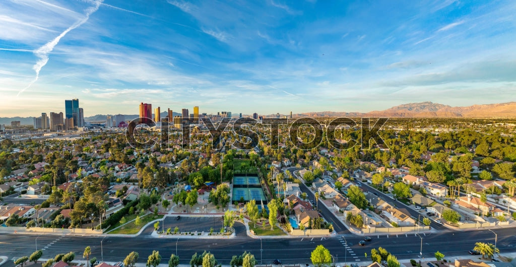 Aerial view of Las Vegas skyline at sunrise with colorful sky