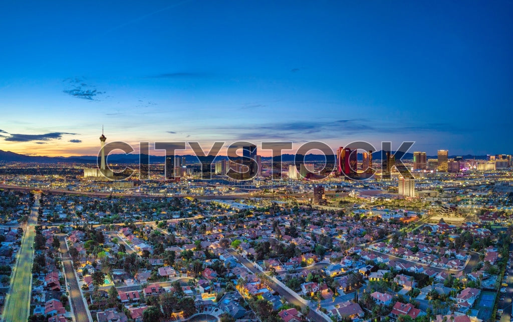 Aerial view of Las Vegas skyline during sunset with vibrant lights