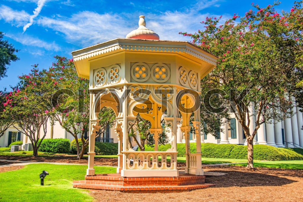 Historical pavilion surrounded by lush gardens in Macon, GA