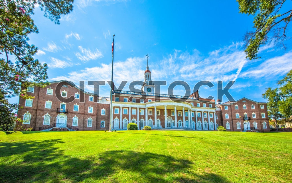 Historic red brick courthouse in Macon, GA on a sunny day with blue sky