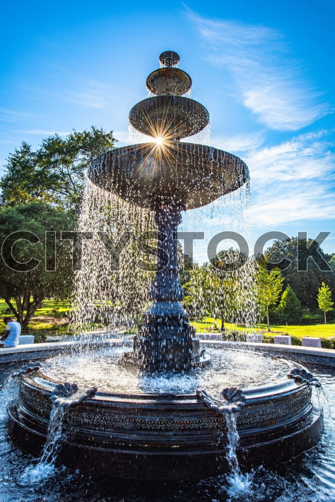 Sunlit water fountain with starburst effect in Macon, GA