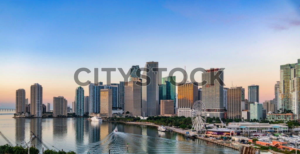 View of Miami skyline and Biscayne Bay at sunrise with marina