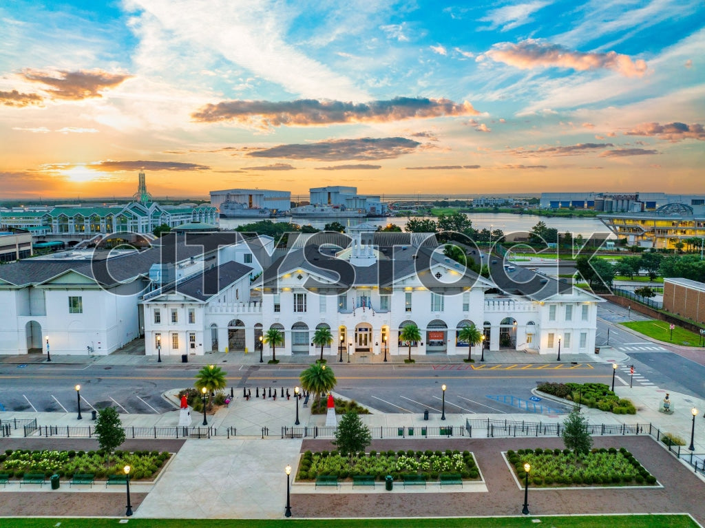 Aerial view of sunrise over Mobile City Hall and riverfront