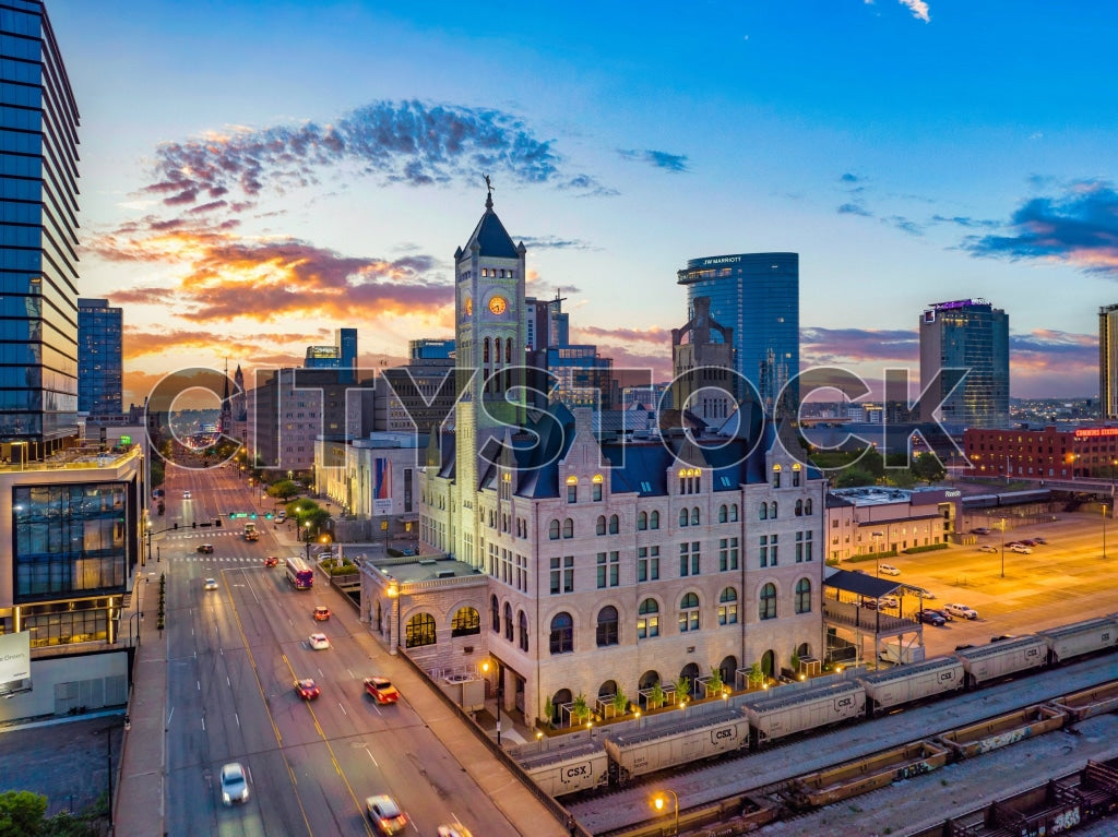 Aerial view of Nashville skyline at sunrise featuring historic clock tower