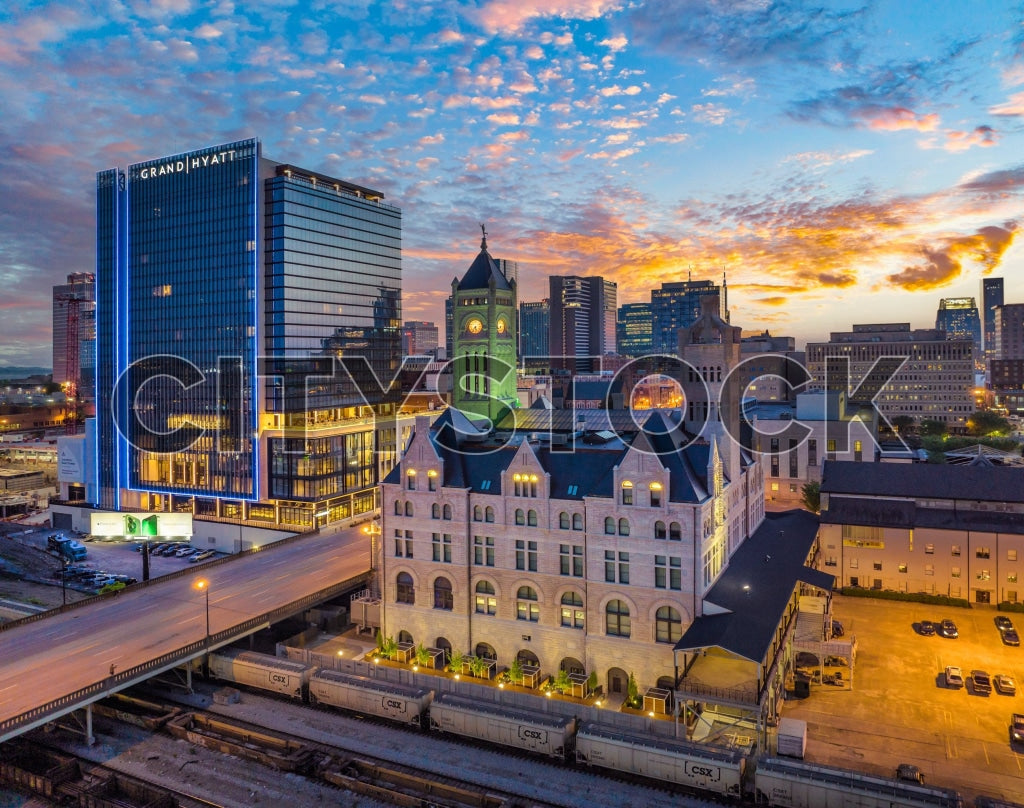 Dramatic sunset over Nashville skyline with historic and modern buildings