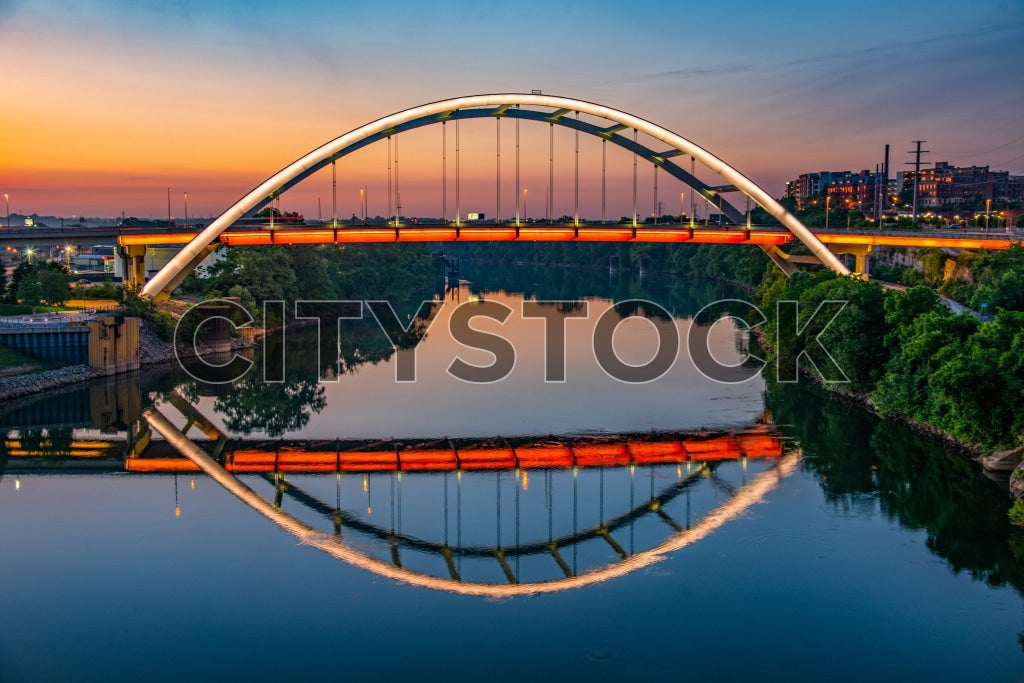 Nashville Arch Bridge Illuminated at Sunset Reflection