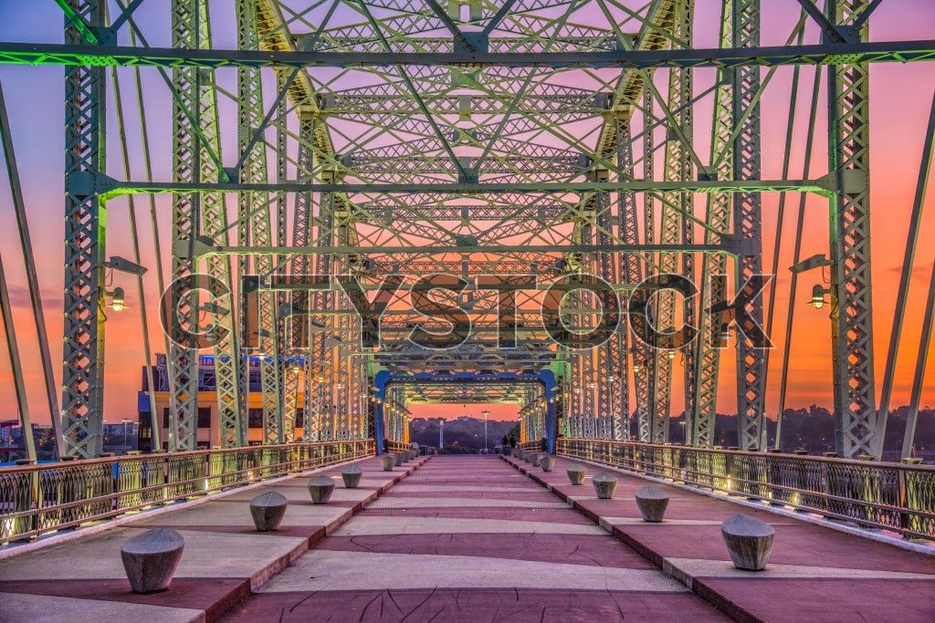 Sunset view over Nashville bridge under vibrant sky