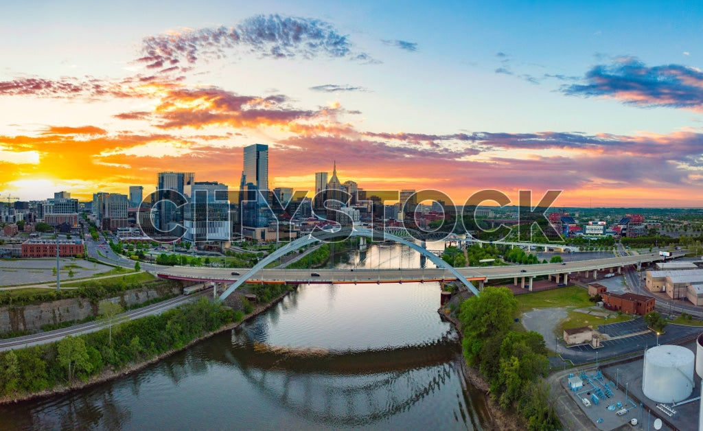 Aerial sunset view of Nashville skyline with Cumberland River