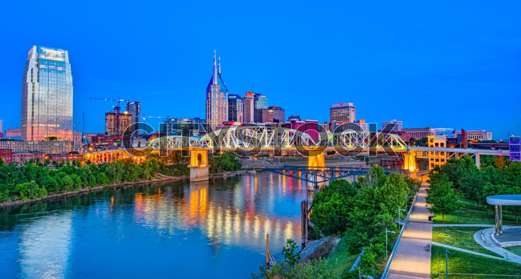 Panoramic Nashville skyline at twilight with Cumberland River