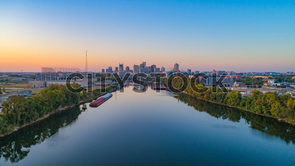Aerial view of Nashville skyline at sunrise with Cumberland River
