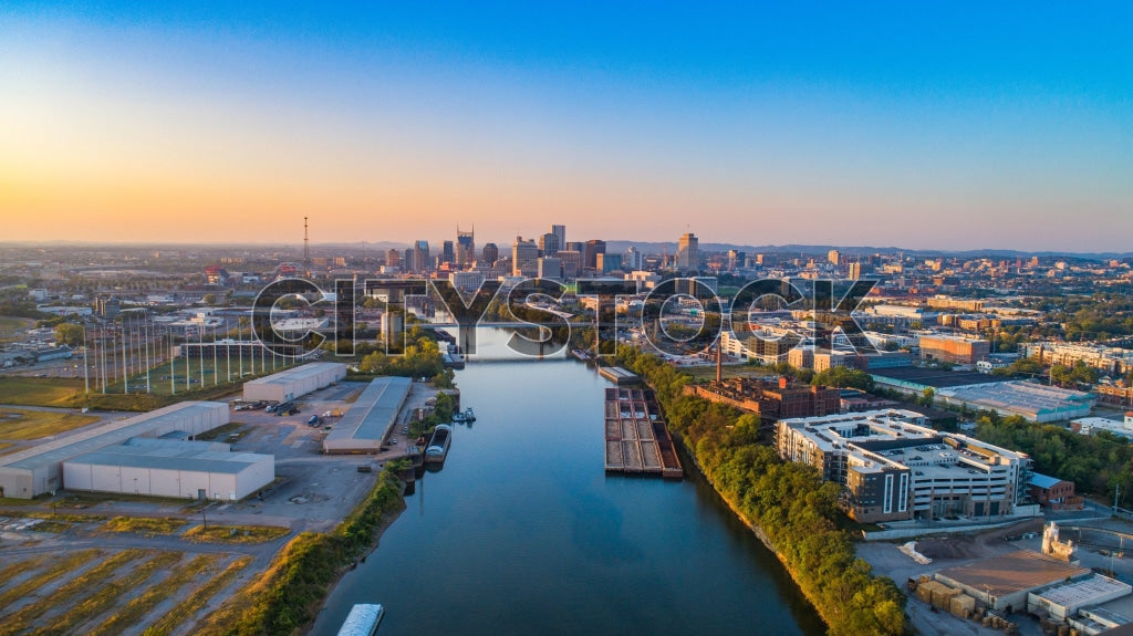 Aerial view of Nashville skyline and Cumberland River at sunrise