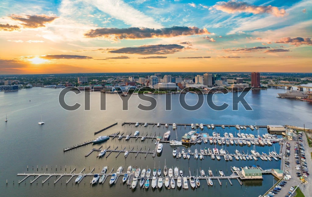 Aerial view of Norfolk Marina at sunrise with vibrant cityscape