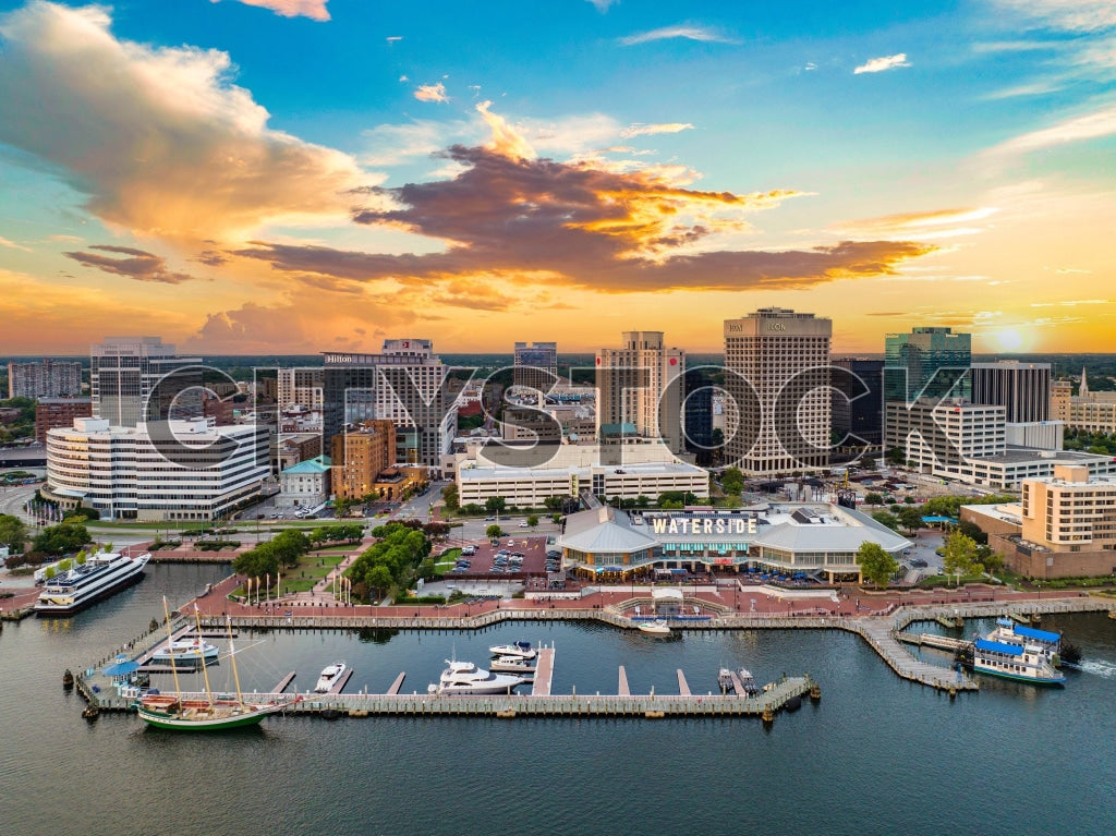 Dawn breaks over Norfolk’s waterfront, featuring cityscape and river