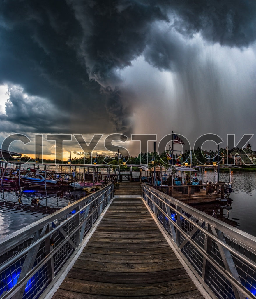 Dramatic view of storm and sunset over Orlando boardwalk