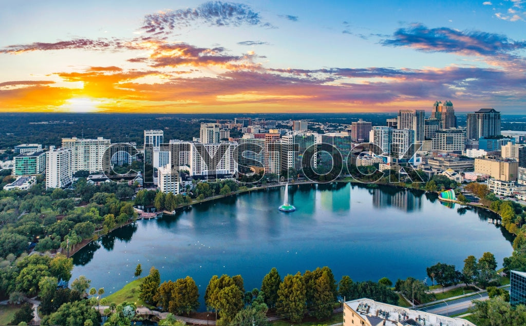 Aerial sunset view of Orlando skyline and Lake Eola