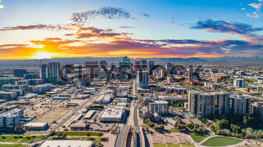 Aerial view of Phoenix at sunset showcasing urban landscape and skyscrapers
