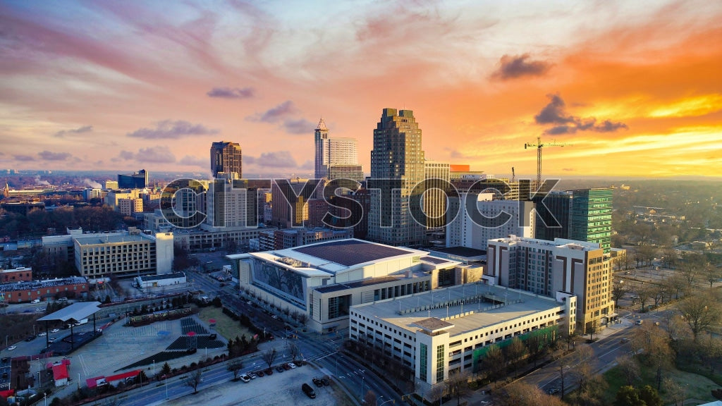 Aerial view of Raleigh NC skyline during sunset, vibrant colors