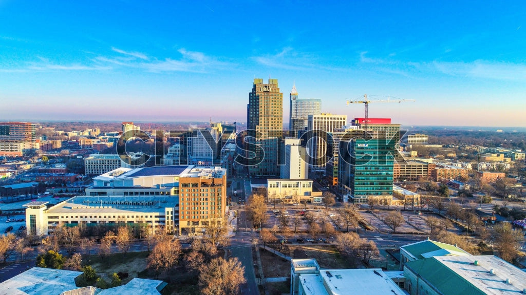 Aerial view of Raleigh, NC downtown at sunrise with clear blue sky