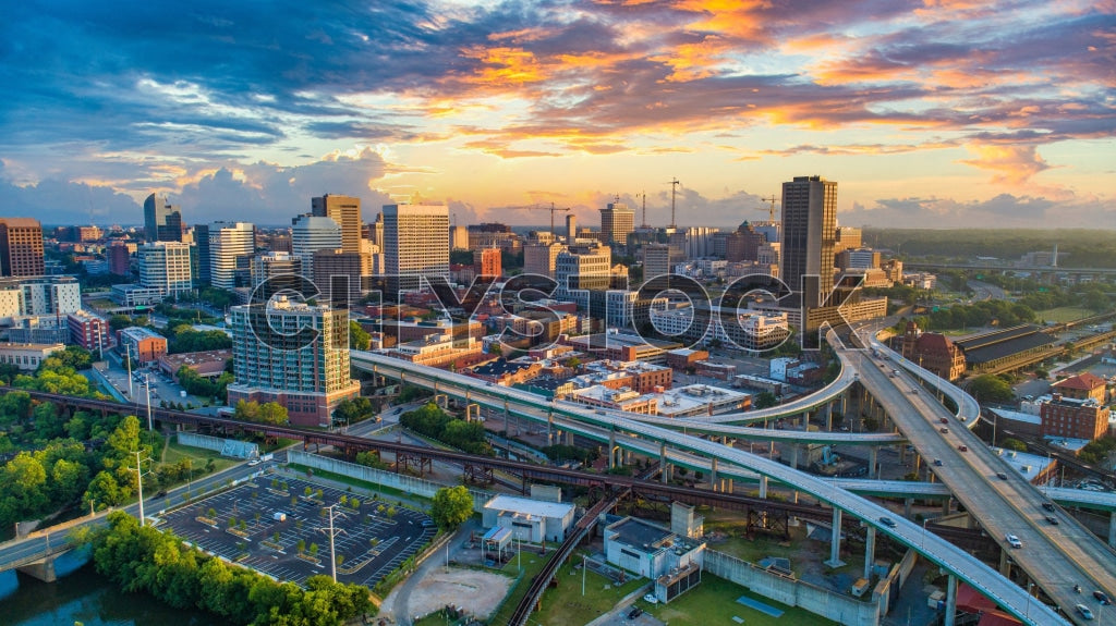 Aerial view of Richmond, VA skyline at sunset with vibrant colors
