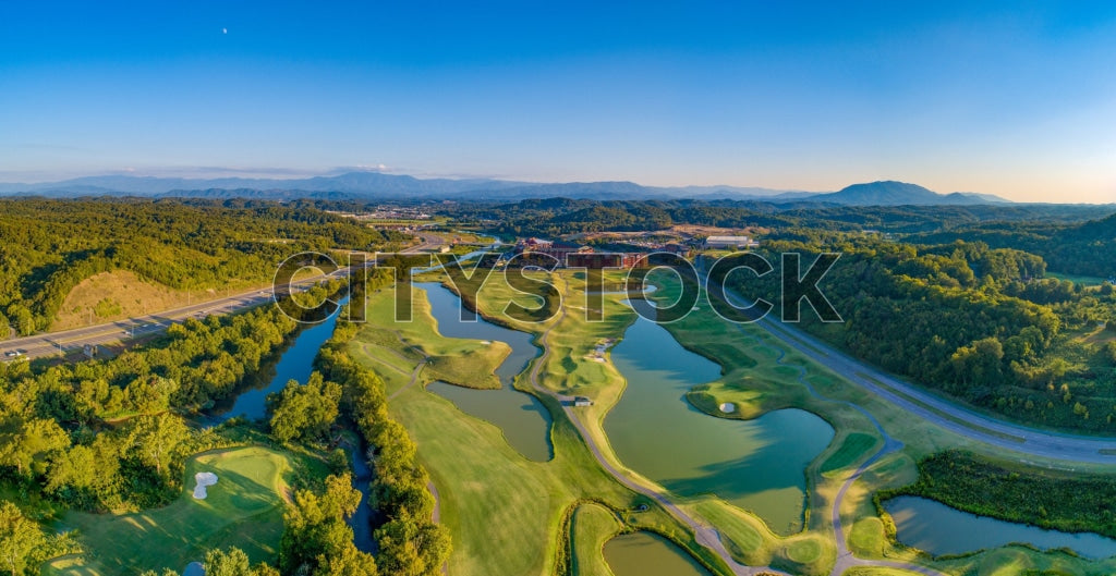 Aerial shot of Sevierville golf course with mountains backdrop