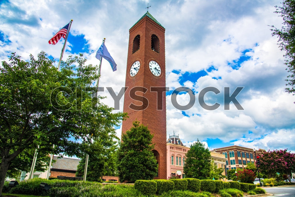 Spartanburg clock tower with American and South Carolina flags