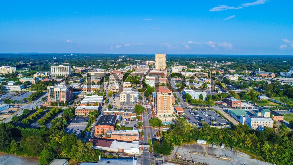 Aerial cityscape of Spartanburg SC on a clear blue sky day