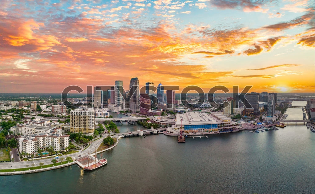 Aerial View of Tampa Bay at Sunset with Colorful Sky and Urban Scene