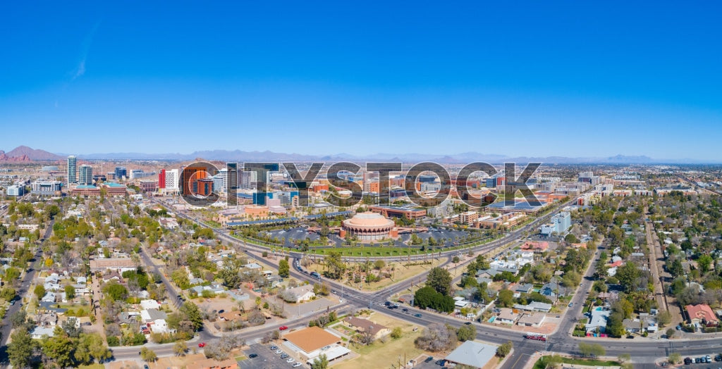 Aerial cityscape view of Tempe, Arizona under a clear blue sky