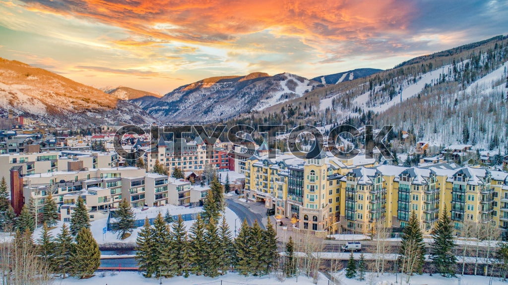 Aerial view of Vail, Colorado during winter sunset with colorful skies