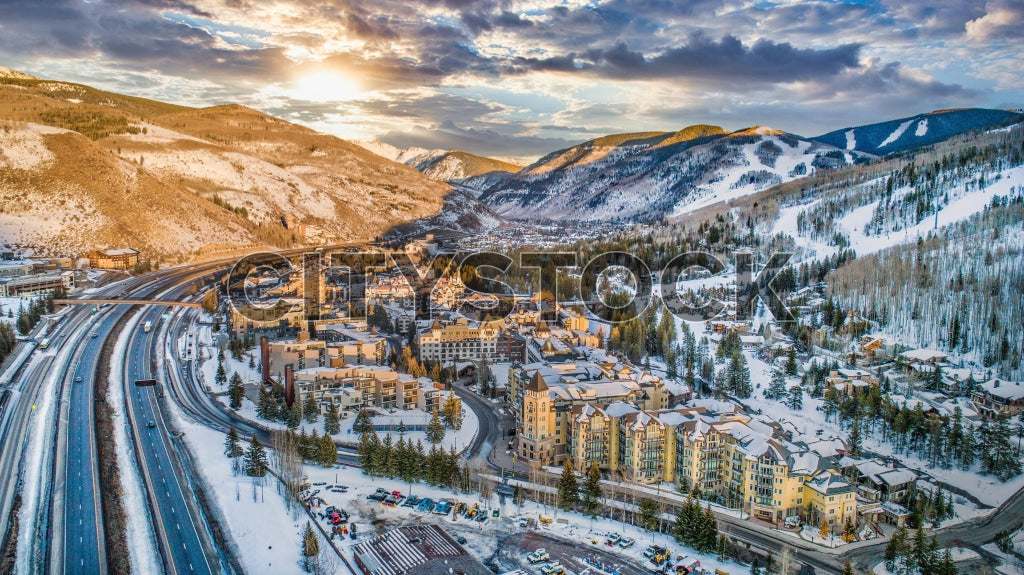 Aerial shot of Vail, Colorado at sunrise with snowy landscape