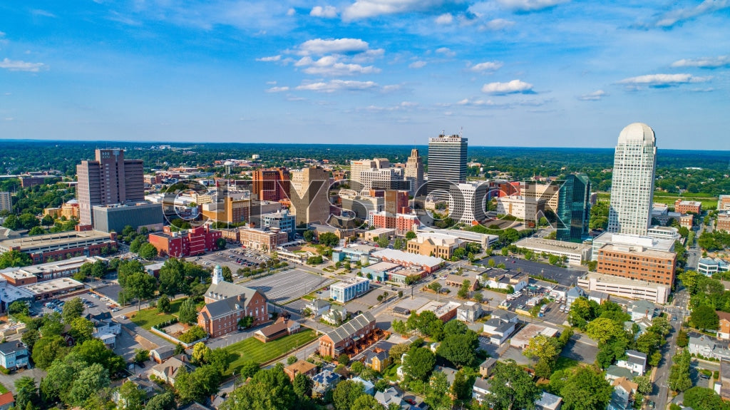Aerial view of downtown Winston-Salem NC with skyscrapers and parks