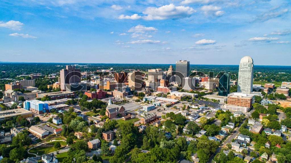 Aerial view of Winston-Salem, NC downtown skyline under blue sky