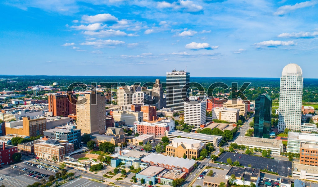 Aerial view of Winston-Salem cityscape on clear sunny day