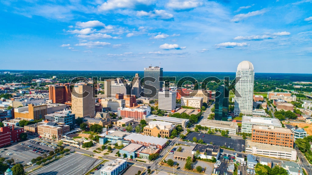 Aerial cityscape view of downtown Winston-Salem, NC with clear skies