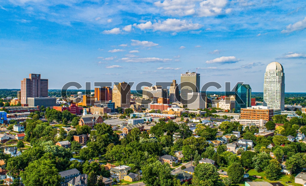 Aerial view of Winston-Salem NC skyline with blue skies